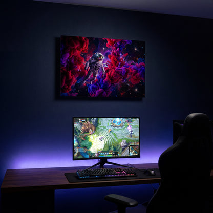 Kovový obraz Astronaut v barevné mlhovině snů jako dekorace nad herním setupem